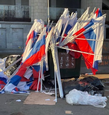 Russian flags in dumpster.jpg