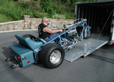 Doc's 400ci Chevy Trike out of trailer.png